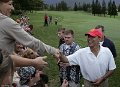 Obama greets supporters after playing a round of golf at the Mid Pacific Country Club in Kailua, Hawaii,